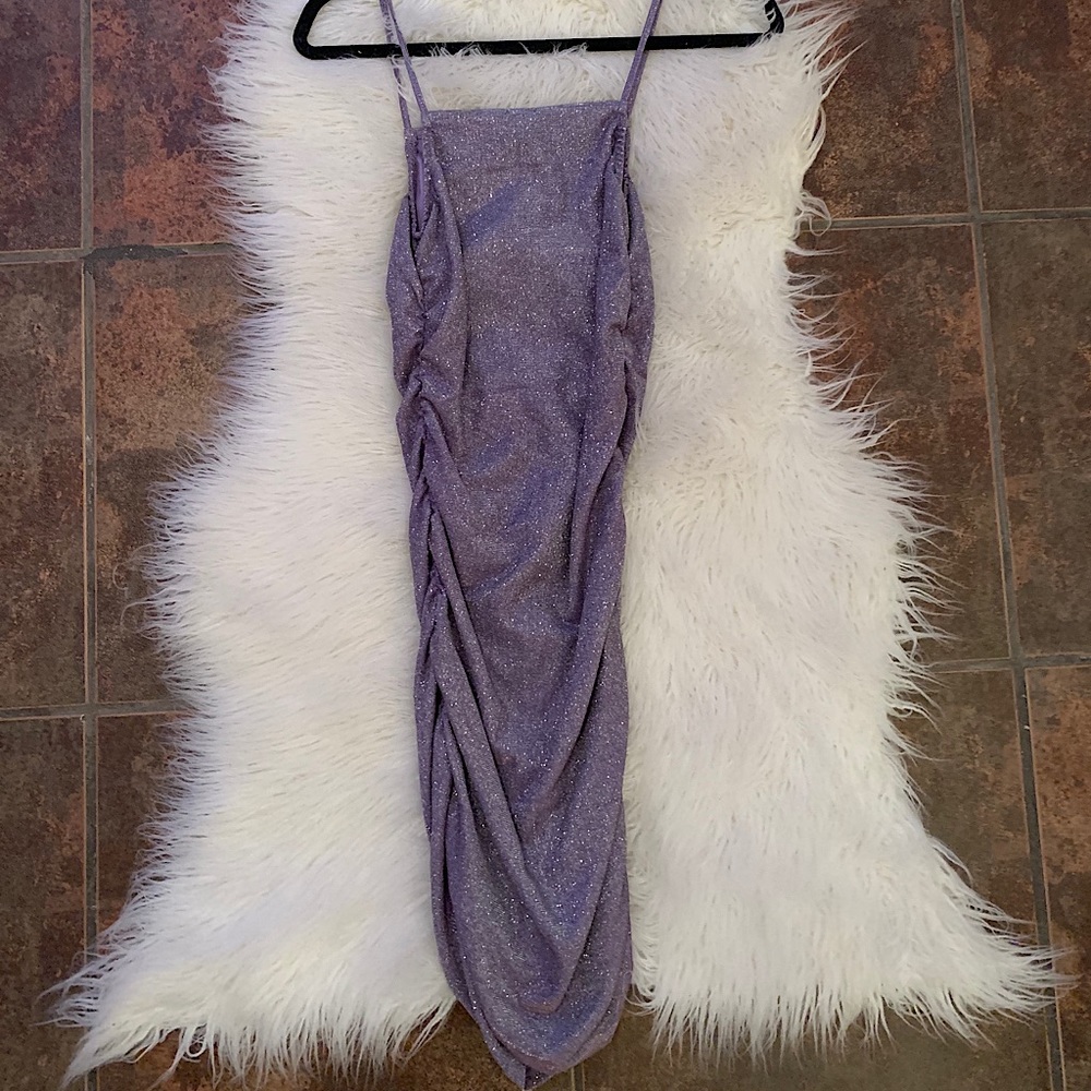 Super cute purple sparky dress.